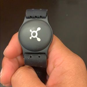 Orange theory heart monitor.